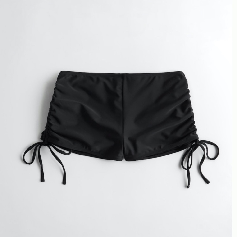 Hollister swim bottoms with  cinches sides